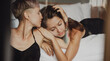 © olezzo - Young tender beautiful lesbian couple in love hugging on the bed