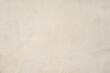 © svetlanais - Beige plastered wall texture background. Plain light beige wall with soft plaster texture, minimal surface relief. Concept of simplicity, neutrality, architectural natural background