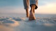 © olga_demina - Close up of a woman's feet walking barefoot on soft, warm sand at sunset, embracing the tranquility of a peaceful summer vacation on the beach, surrounded by nature's beauty