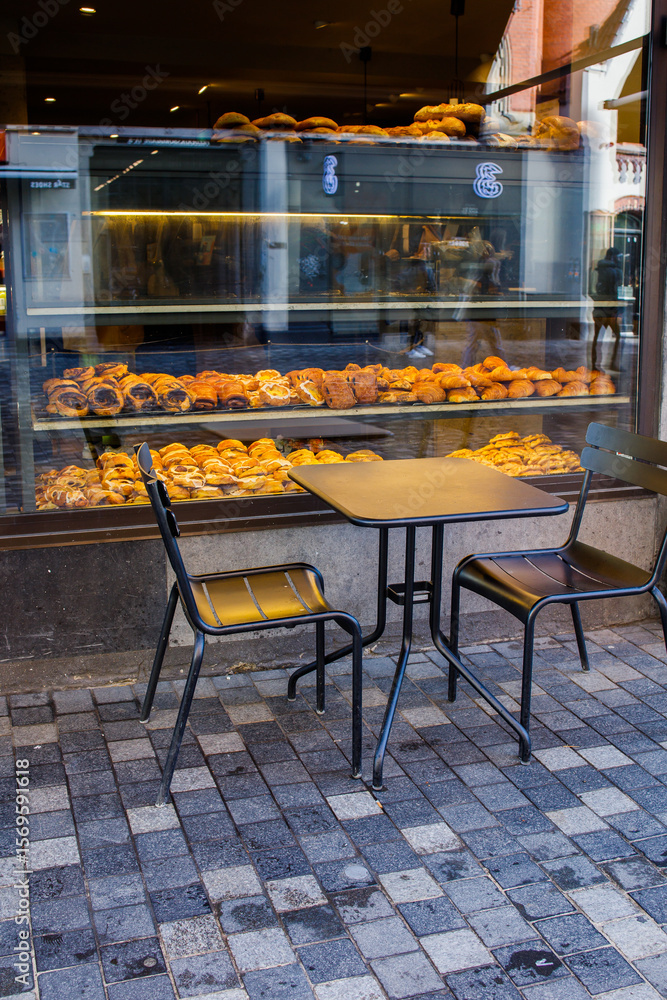 Pastery Window Outside Danish pastry: many different sweet buns made in bakery through the ...