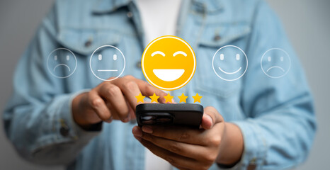 Canvas Print - Happy customer providing 5-star review via mobile application after receiving outstanding service and quality product. Online customer feedback plays crucial role in business ranking, Consumer trust