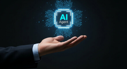 human hand presenting a glowing ai agent chip with digital circuitry