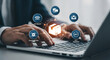 © Inspire Shots Hub - Hands using laptop, showcasing AI-powered logistics system with icons for air freight, sea freight, warehousing, and 24/7 tracking, symbolizing efficient supply chain management