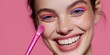© Karyn - The vibrant beauty model showcasing colorful makeup and a joyful smile.