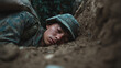 © Desmilka - A soldier in camouflage fatigues sleeping in a trench, resting his head near sandbags.