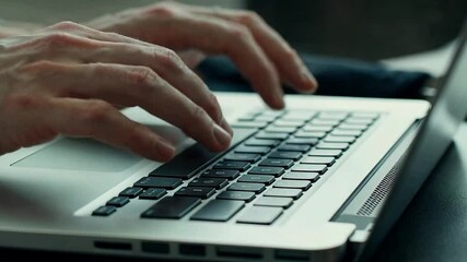 Video 4k typing on laptop keyboard for work or study at home office for business or personal use concept
