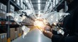 © Paul Studio - Person using tablet with world map overlay, representing global logistics and distribution within a warehouse setting.