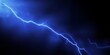© MDMIJANUR - A dramatic display of blue lightning striking across a dark and ominous sky space