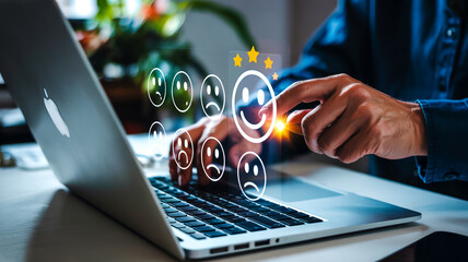 Close-up photo of laptop screen showing customer feedback interface with rating stars, comments, and submission button