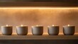© illustratica - Glowing candles on wooden shelf