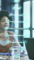 Wall Mural - animation of dna strand spinning over diverse business people in office