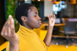 © Westend61 - Businesswoman practicing yoga with eyes closed at office