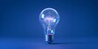 © ShemoRani - A bright, glowing lightbulb, isolated on blue, dark, and black backgrounds, symbolizes energy, innovation, and creative ideas