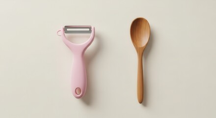 Pink Peeler and Wooden Spoon on Cream Background Minimalist Kitchen Tools.