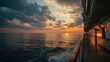 © gleb - Sunset view from a cruise ship deck over calm ocean waters with dramatic clouds and golden reflections, perfect for travel promotions, cruise brochures and summer escape visuals