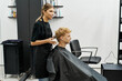© LIGHTFIELD STUDIOS - Stylists share the latest beauty trends in a modern salon environment full of creativity