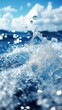 © Iswanto - Water droplets splash in bright blue waves under a partially cloudy sky