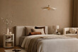 © FollowTheFlow - Stylish interior design of bedroom with pillows, bedsheets and personal accessories.