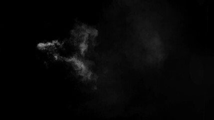 Wall Mural - isolated wisp of white smoke drifts from left to right on black background. subtle vfx element for m