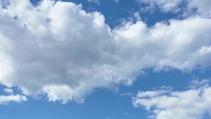 Wall Mural - beautiful blue sky with soft white clouds timelapse