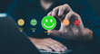 © loechai - Businesspeople rate their satisfaction and praise the products and excellent service, customer care of employees. to express opinions and give 5 star