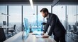 © Gilang - Sophisticated businessman examining futuristic interface for data analysis at work