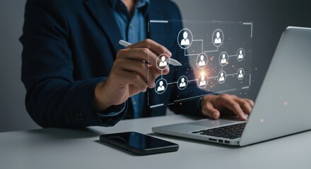 Photo of a businessman visualizes a network connection and team collaboration structure on a laptop