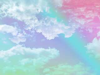 Wall Mural - beauty sweet pastel pink and green colorful with fluffy clouds on sky. multi color rainbow image. abstract fantasy growing light