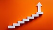 © Ellen - white staircase with upward arrow on bright orange background concept of growth and progress