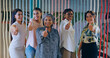 © Raushan_films - Indian happy active woman lady expert group show thumps up do hand sign look cam make pose at job work place Asian smiling young adult proud girl female staff good team staring camera indoor office