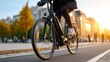 © Pinit - A cyclist effortlessly riding on a bike lane with an electric bicycle.
