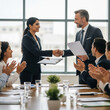 © Sumanta - business people shaking hands in meeting. Boss praising proud Indian female employee. congratulating with corporate success, handshaking, express appreciation and recognition, colleagues clap hands.