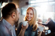 © Davor - Smiling couple enjoying coffee and conversation at cafe