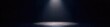 © Latsamee - A single, bright stage spotlight illuminates a dark empty stage, creating a dramatic effect Perfect for theatrical, performance, and entertainment concepts , concert, shadow