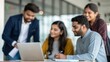 © N7 - Multiracial group including Indian professionals sharing ideas in modern workspace