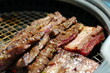 © 지혜 김 - Korean BBQ with Raw Beef Short Ribs Grilled on Charcoal at Local Galbi Restaurant