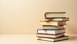 © Nathaphat - Stacked Books on a Light Background with Soft Lighting and Minimalistic Design Aesthetic