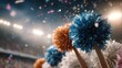 © Quail 8s Studio - Fans hold colorful pom poms at a sports event with confetti falling cheer leader