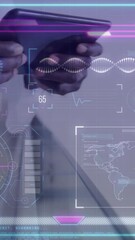 Wall Mural - Animation of data processing and dna strand over male doctor holding tablet