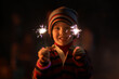 © Austockphoto - Little boy waving sparklers on a bonfire night