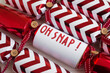 © Austockphoto - christmas cracker with fun 'oh snap' message