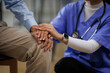 © David - Help health or Doctor or nurse holding hands with patient zoom for support
