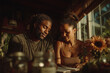 © Dzmitry - Black couple engages in intimate planning and journaling at home
