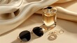 © Jony - Luxurious Still Life: A Golden Perfume Bottle, Aviator Sunglasses, and Diamond Ring on Silky Beige Fabric Presenting Elegant Sophistication.