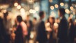 © Harry - Blurred gathering of people at an event illuminated by warm lights creates inviting atmosphere.