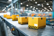 © Ekkarat_Studio - Yellow Boxes on Conveyor Belt in Modern Warehouse with Blurred Background and Industrial Setting