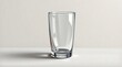 © Barokah - Minimalist clear glass on a white surface with subtle soft lighting