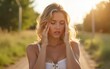 © li - Young woman having hot flash and sweating in a warm summer day. High quality