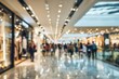 © Kika - Blurred indoor shopping mall, people walking