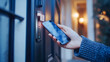 © HA THOLIYA - Hand using smartphone for close digital door lock at home or apartment. NFC Technology, Fingerprint scan, keycard, PIN number, smartphone, electrical and contactless lifestyle concepts